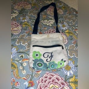 Embroidered F shoulder purse